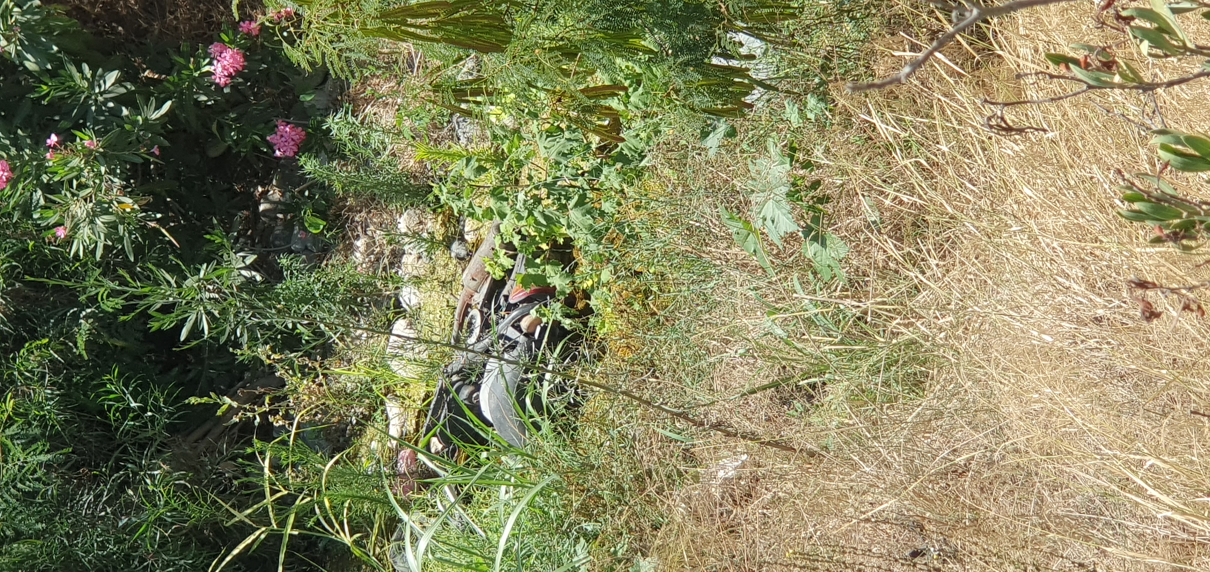 Motorbike thrown into the river