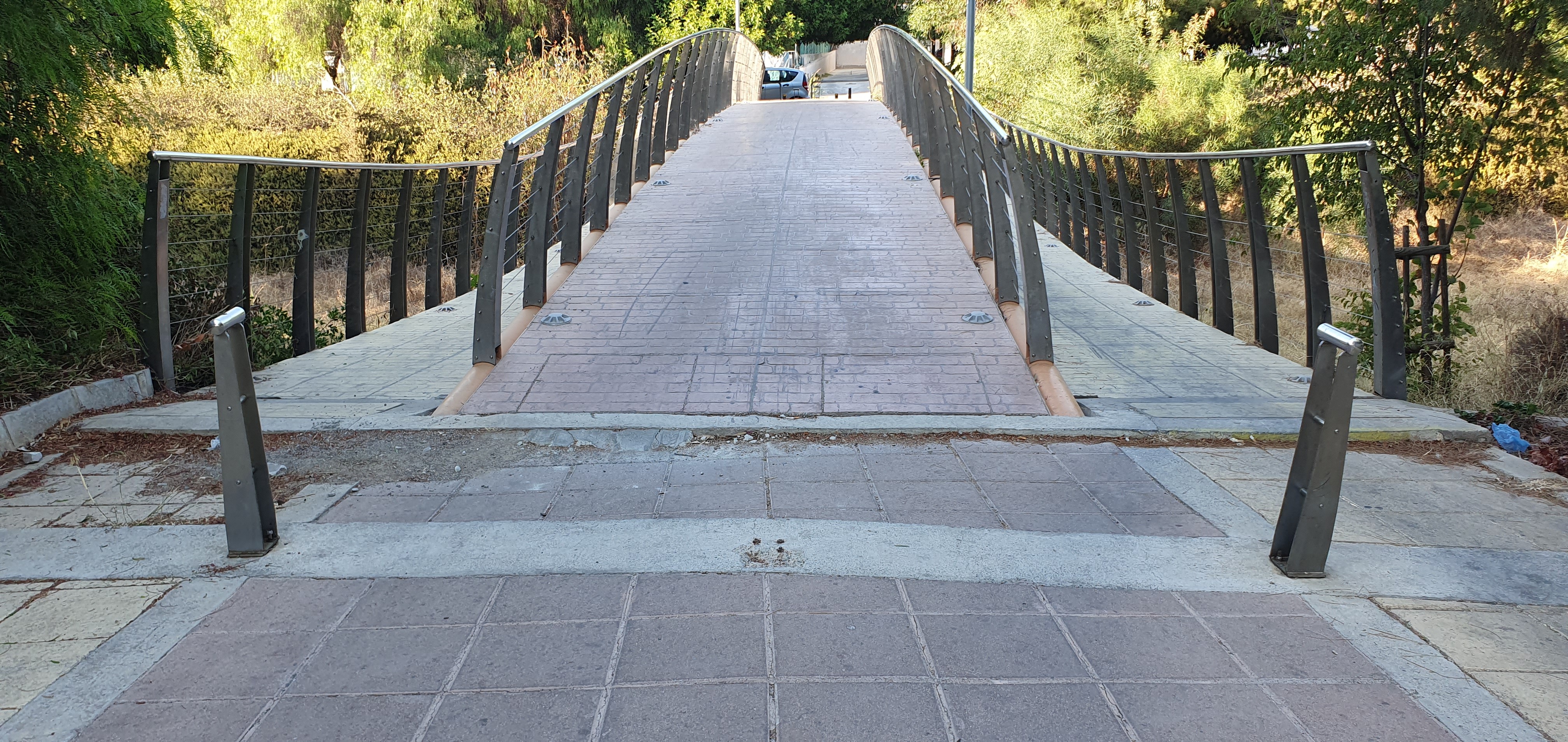 No barriers on footbridge motorbikes cross the bridge constantly