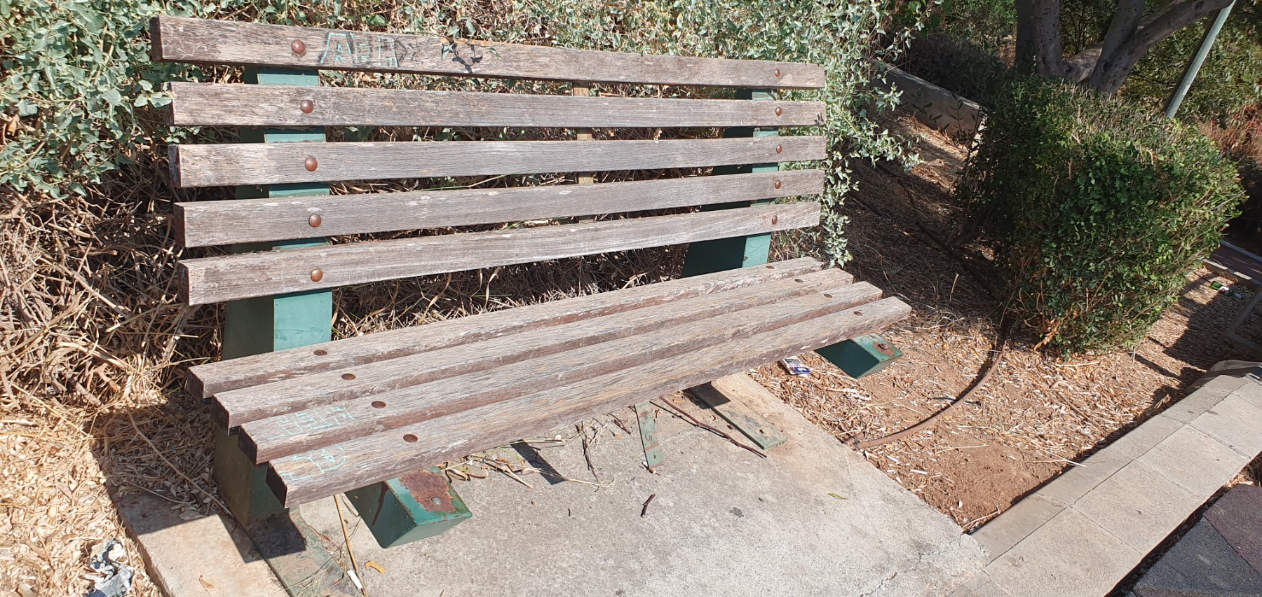 Broken bench in childrens' playground