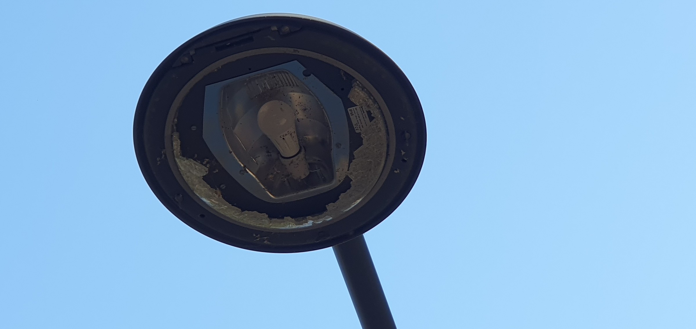 Broken glass on light
